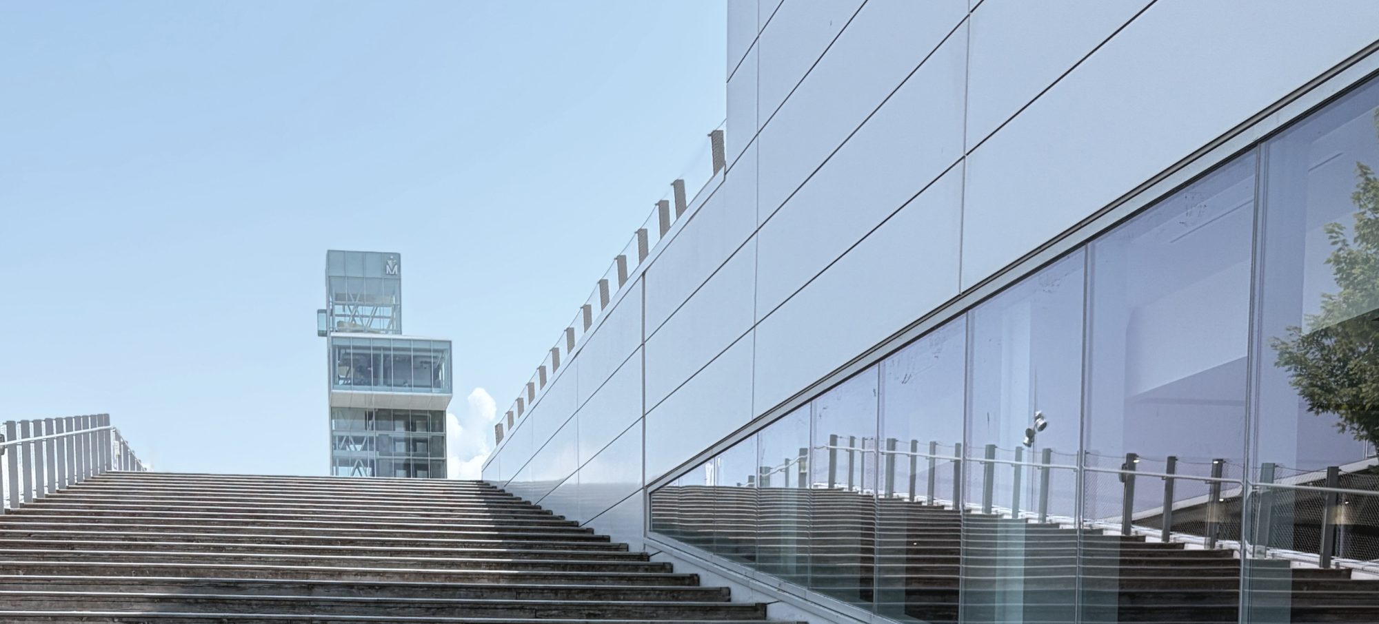 Concrete stair and glazed facade